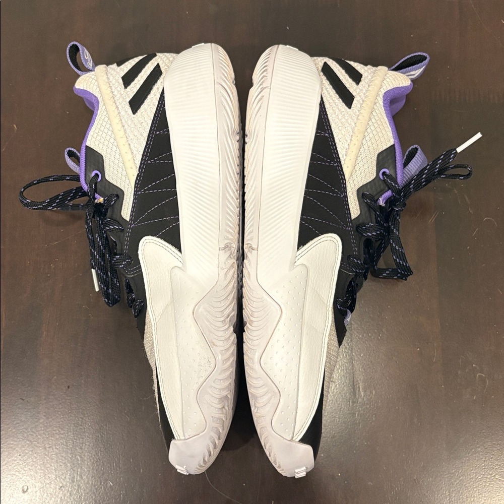 Adidas Dame’s in white and purple rush color way